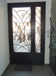 фото металлические однопальные двери со стеклом